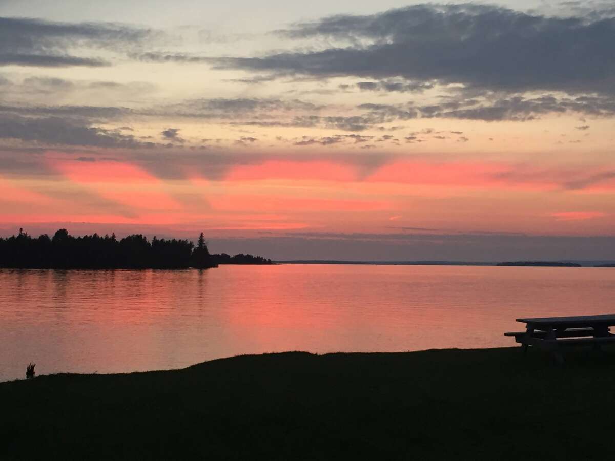 Sunset overlooking Lake Huron on Drummond Island Michigan Northern Properties
