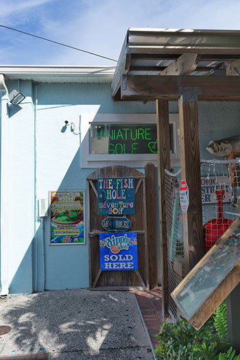 The Fish Hole Miniature Golf Sign in Anna Maria Island Florida USA