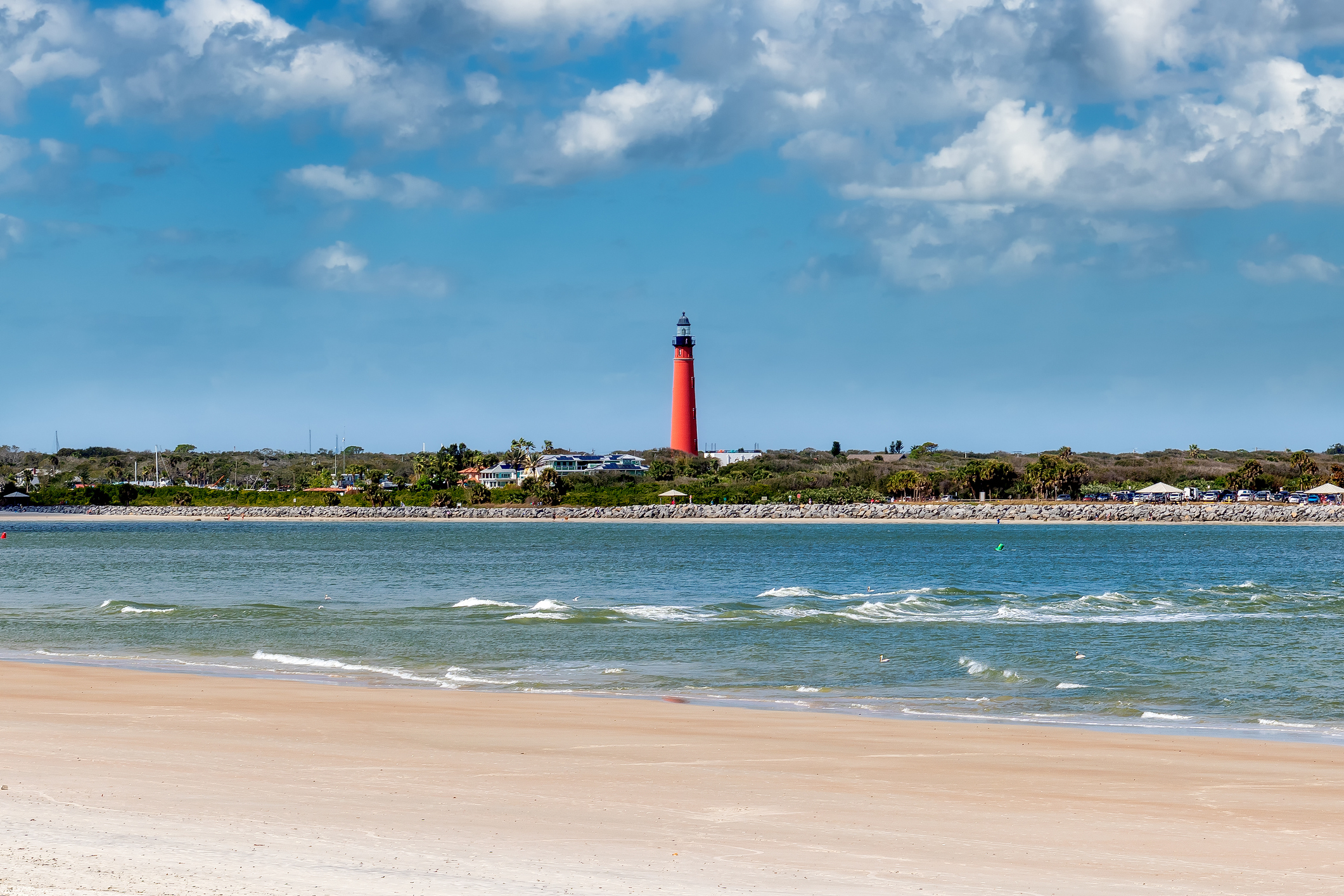 View of Lighthouse across Ponce de Leon Inlet from New Smyrna Beach