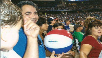 People Enjoying A Sports Event With A Beach Ball