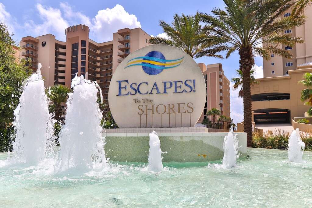 escapes to the shores sign