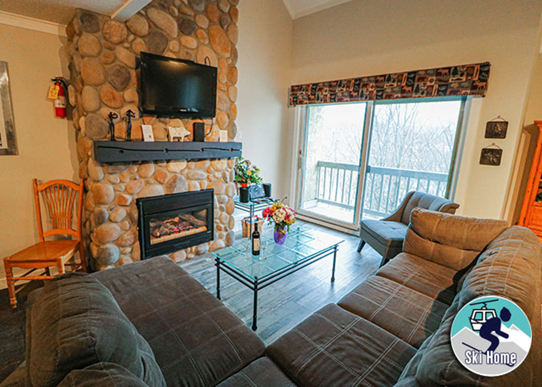 Gas fireplace to keep you cozy no matter the weather outside. Large wall-mounted flat-screen TV to make sure you don't miss out on any of your favorite shows