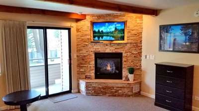 Built-in TV and DVD above fireplace