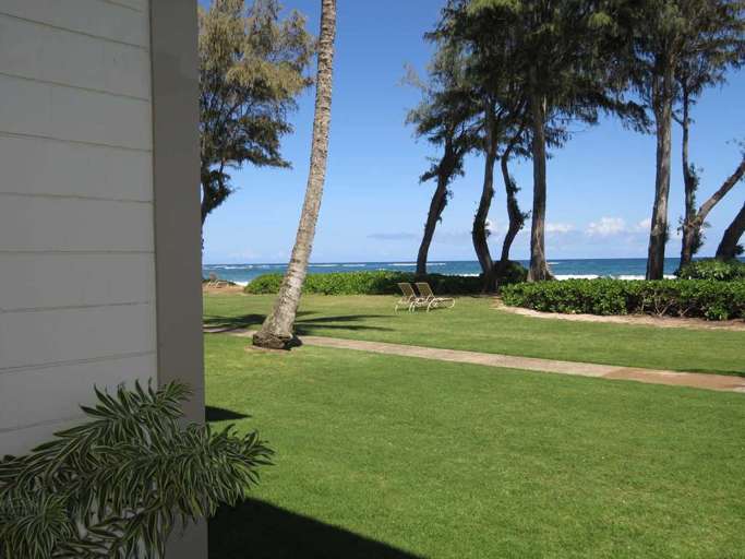 VIEW FROM LANAI LOOKING LEFT.  STEPS FROM PRIVATE BEACH!