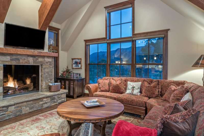 Living Room has Mountain Views and a Gas Fireplace