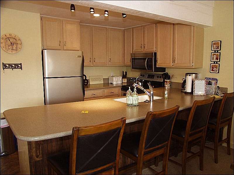 Kitchen with bar seating for 4