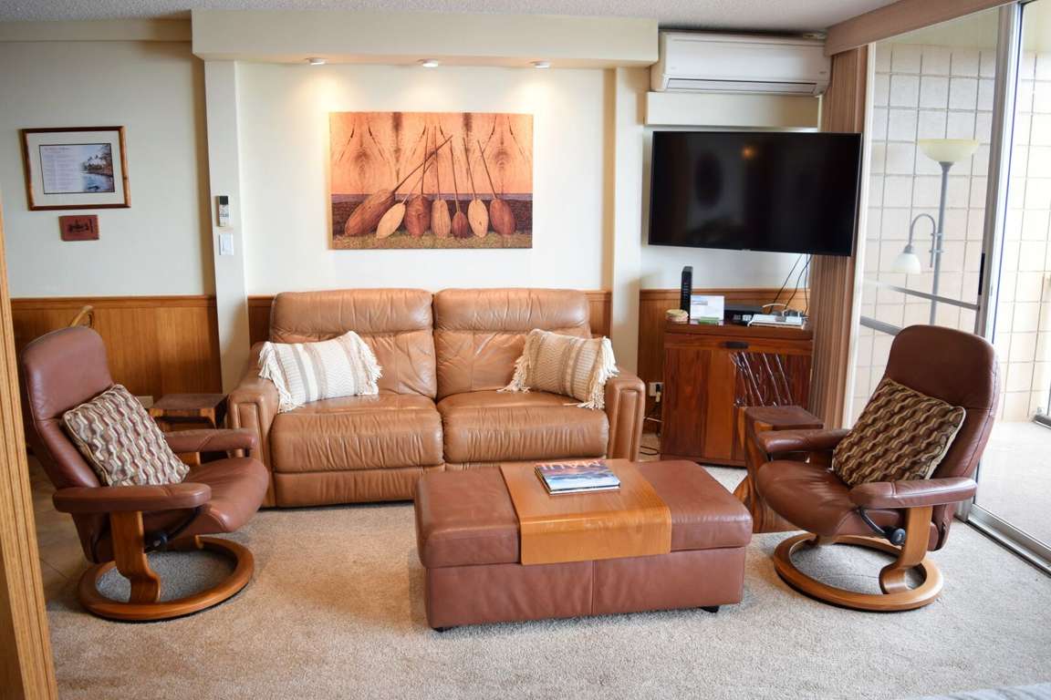 Living area with TV and comfortable furniture