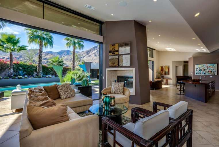 Living Room Features a Gas Fireplace and Beautiful Mountain Views