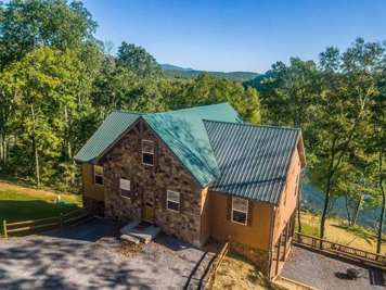 Brand new river-front cabin with ridiculous views and open spaces!
