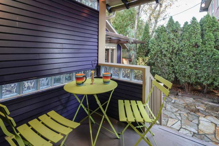 Sip your morning coffee or tea on this covered porch.