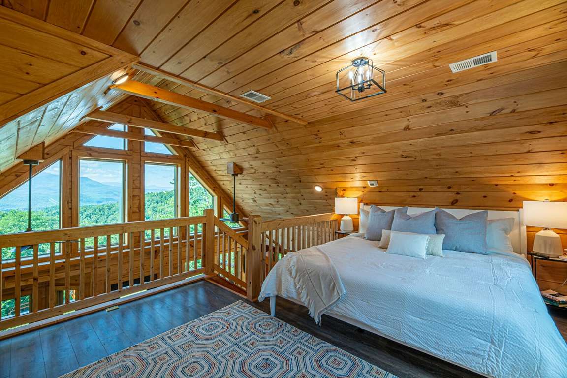 This 2nd bedroom space is located in the loft and boasts an incredible view!