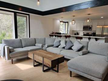 Large wraparound sectional is perfect for lounging or large groups