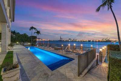 HarbourView Key - This coastal-living 5 bedroom, 3 full-bath, two half-bath estate fit for royalty
sets on the edge of Harbor Inlet overlooking the Port Everglades waterway.