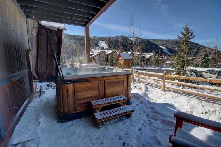 Backyard with a relaxing hot tub