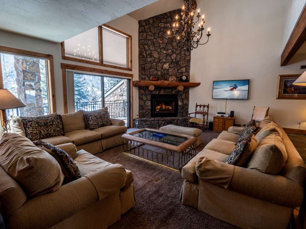 living room with a cozy fireplace