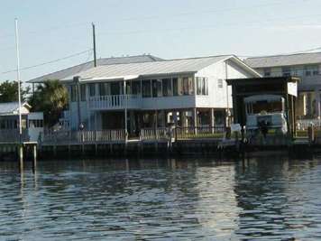 Horseshoe Beach Florida waterfront house rental with boat dock and 3 bedrooms